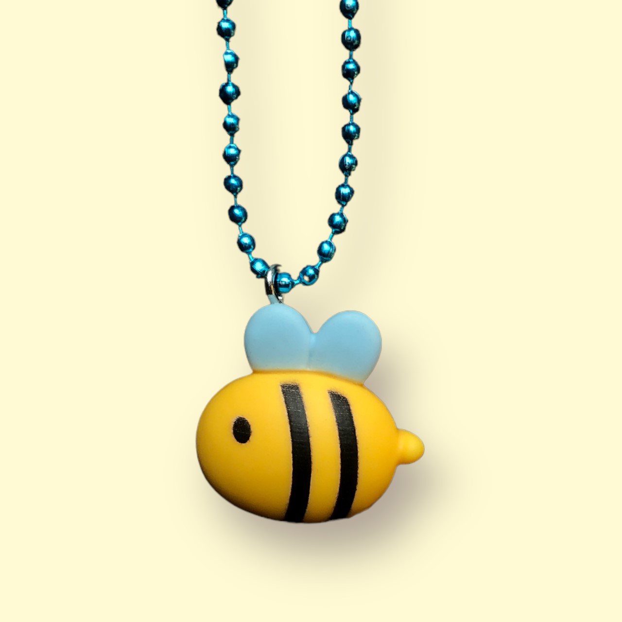 Pluys ketting regenboog Bee